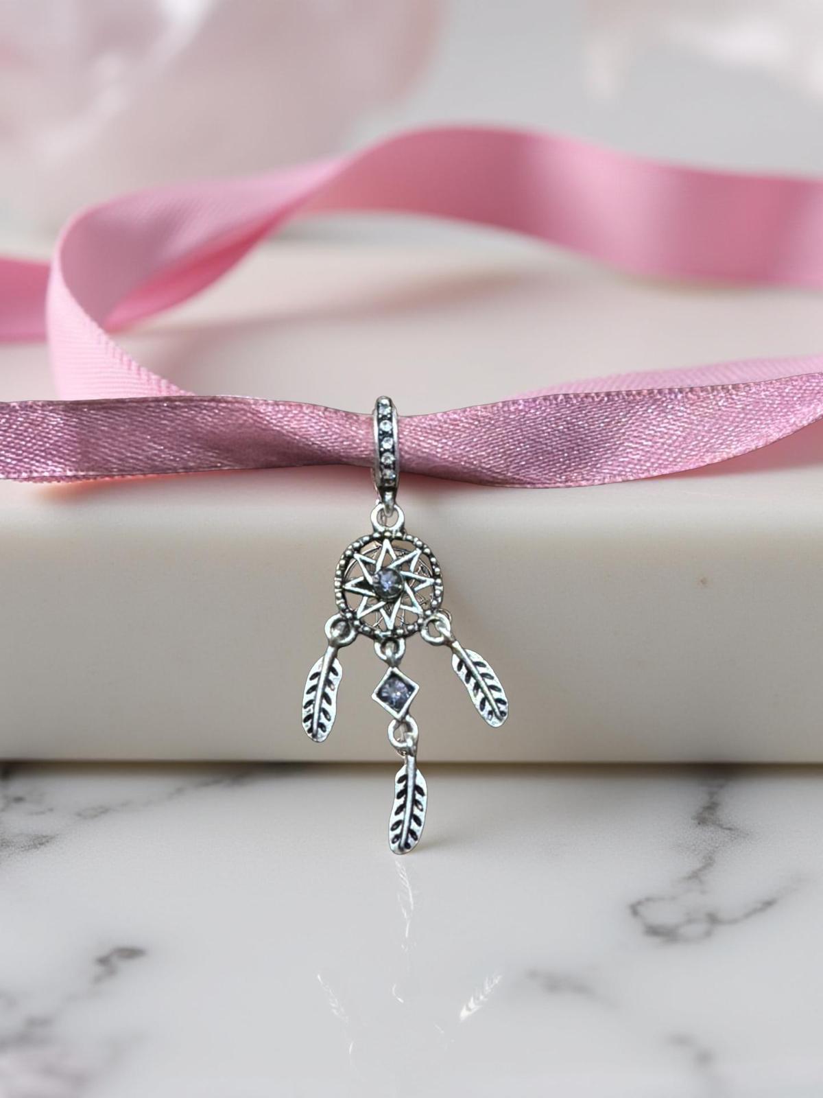 CIONDOLO CHARM ROTONDO STELLA CON PIUME ACCHIAPPASOGNI PER BRACCIALE