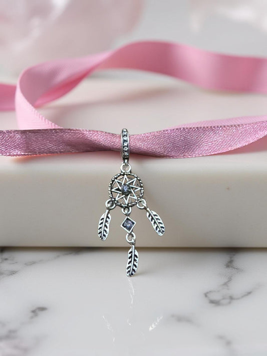 CIONDOLO CHARM ROTONDO STELLA CON PIUME ACCHIAPPASOGNI PER BRACCIALE