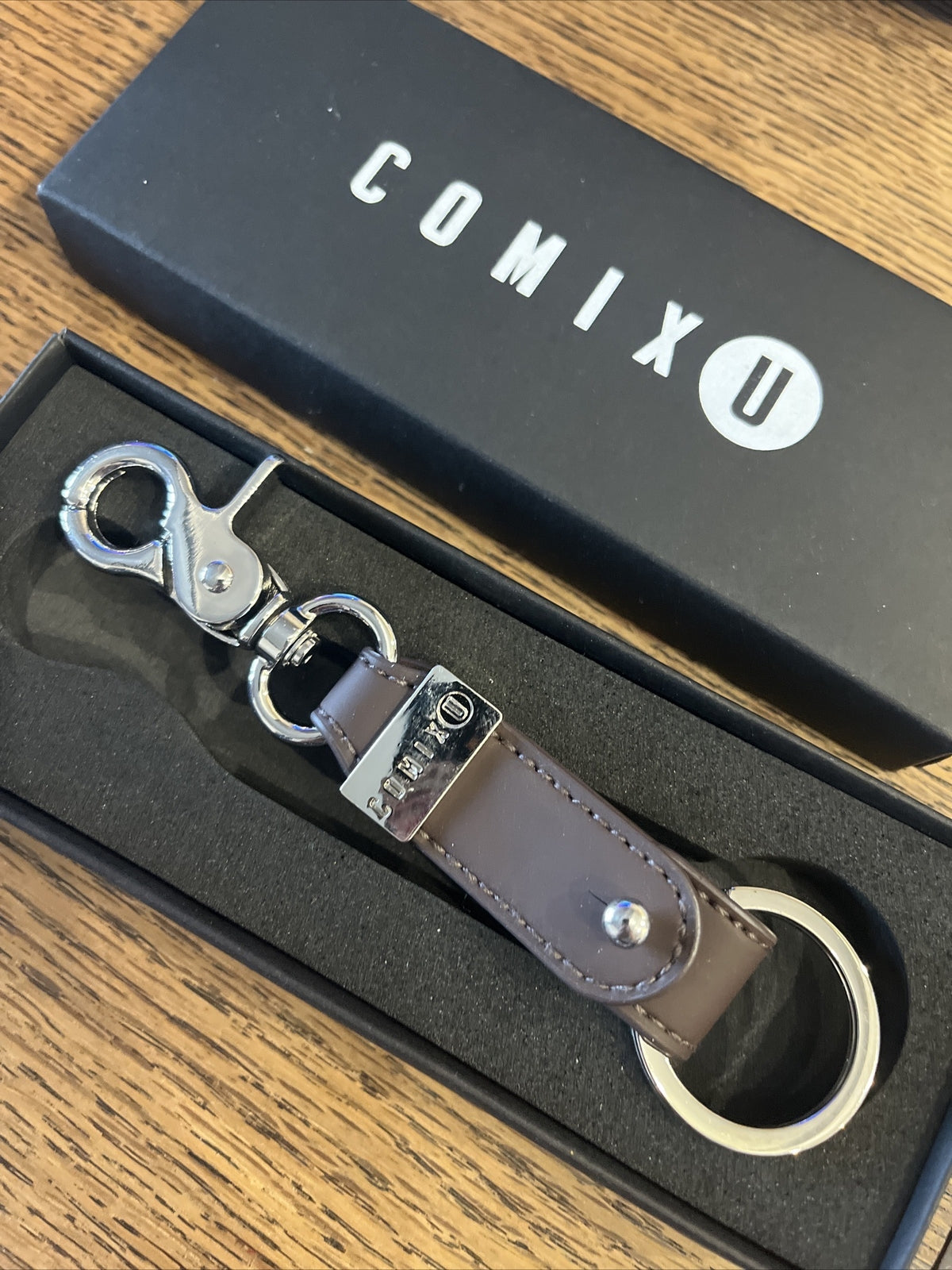 portachiavi chiave comix U marrone con anello scritta in metallo 13,5 cm